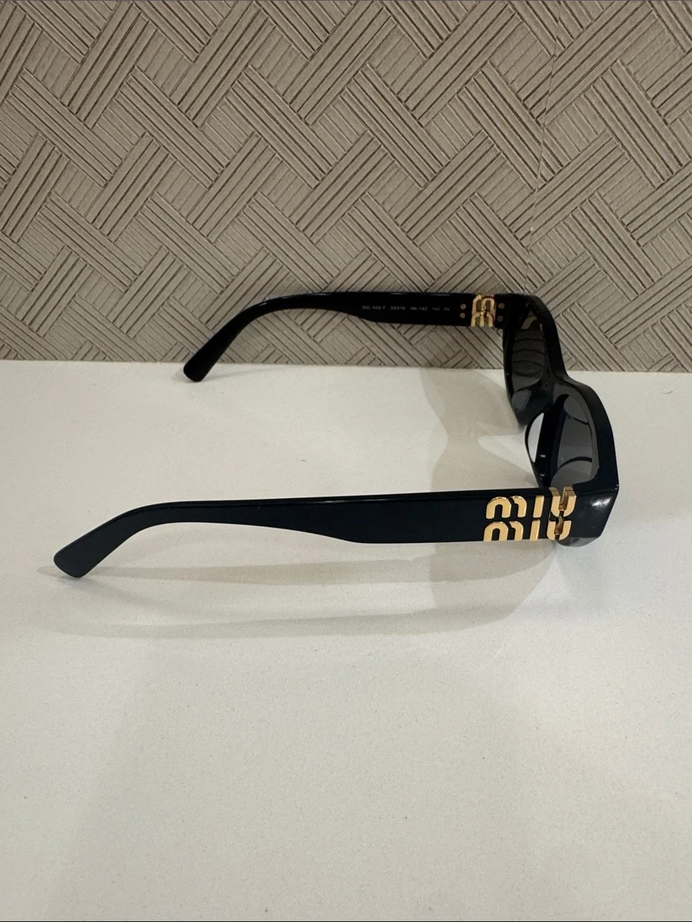 Miu Miu Black sunglasses  Miu Miu MU A03S